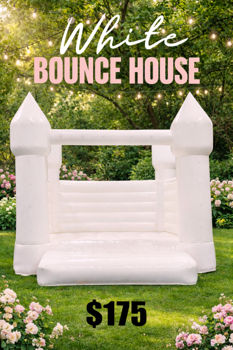 White Castle- $175 16X16 White bounce house with a castle design, surrounded by greenery, priced at $175.